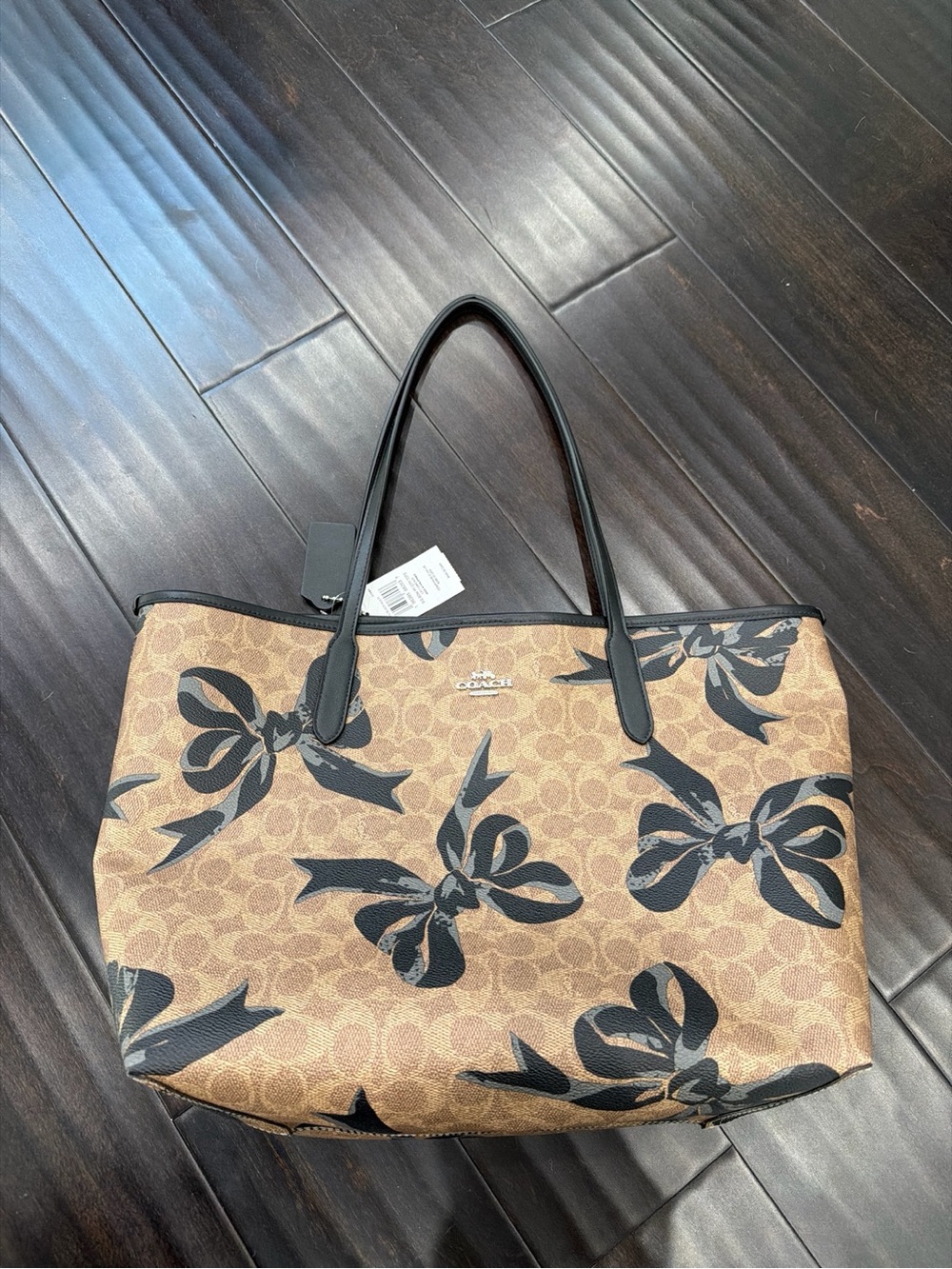 Coach Brown Signature Tote with Black Bow Motif